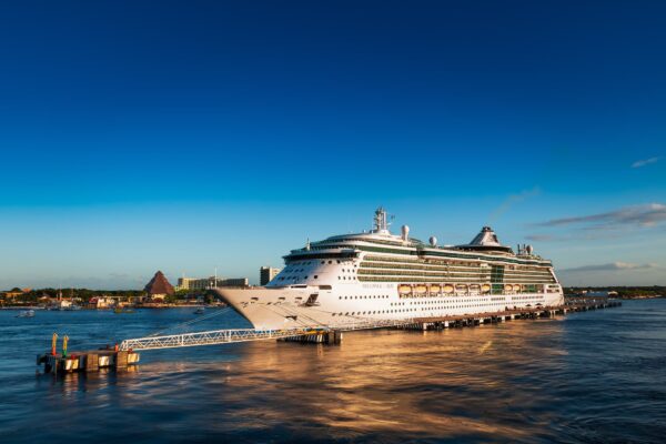 The Royal Caribbean cruise ship Brilliance of the Seas, docked in the evening sun at Puerta Maya, Cozumel, Mexico.